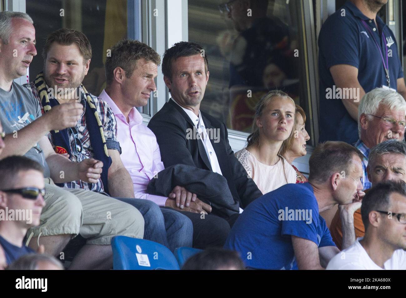Incoming manager of Scottish Premiership club Celtic Ronny Deila (C) and Director of Football in Stromsgodset, Jostein Flo (3rd from left) on the stand during the match between Deila`s former club Stromsgodset and Haugesund in the Norwegian top football league in Drammen, 9 June 2014. Photo by Audun Braastad, NTB scanpix Stock Photo